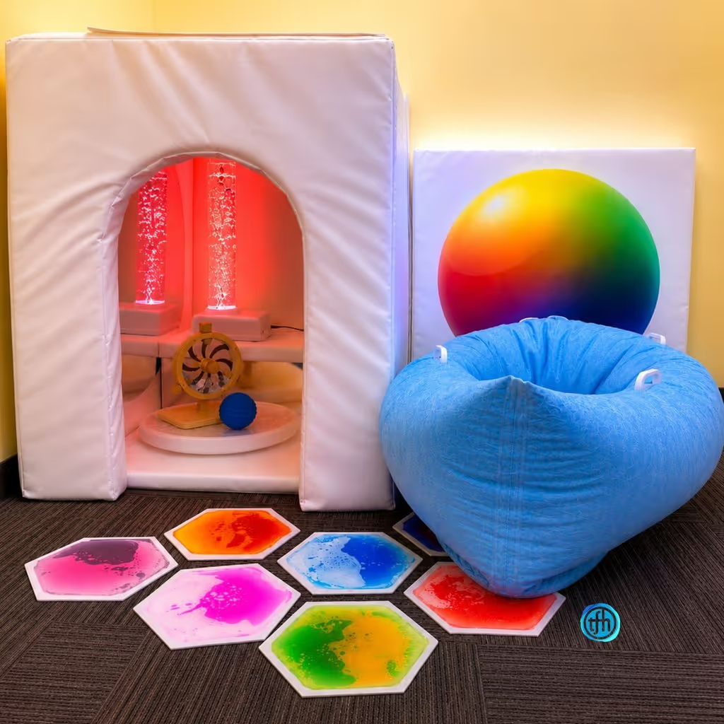 Colorful sensory room with beanbag and bubble tubes