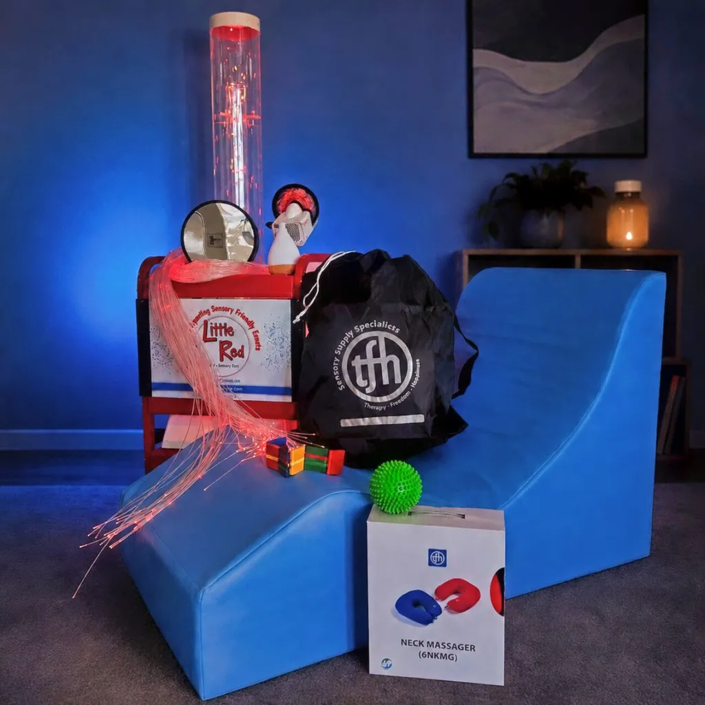 Sensory therapy setup with blue wedge chair
