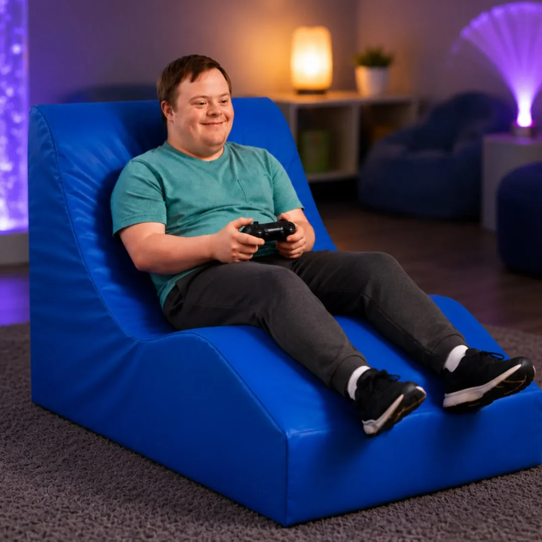 Person playing video games on blue chair