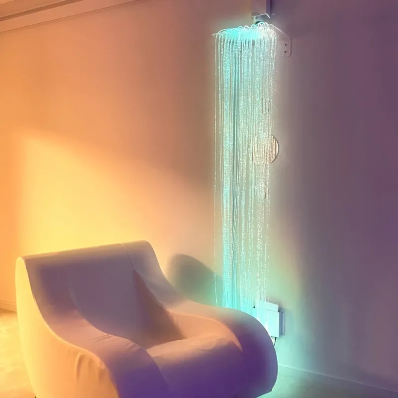 Modern curved lounge chair with fiber optic lighting